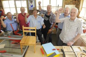 Shed men celebrate