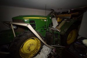 Tractor ploughs into house
