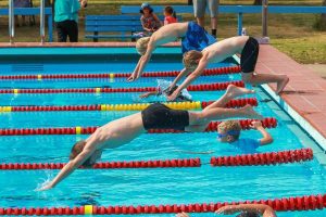 Swimmers show their colours