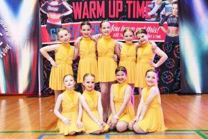 Cheery competitors strut their stuff