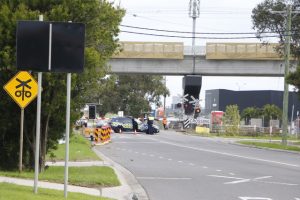 Stuck boom gates close Racecourse Road