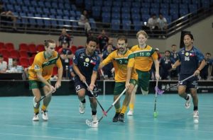 Six locals pull on the green and gold