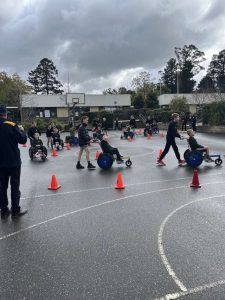 Students in motion for wheelchair support