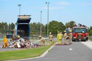 Smoke forces garbage truck to dump load due to incorrectly disposed waste