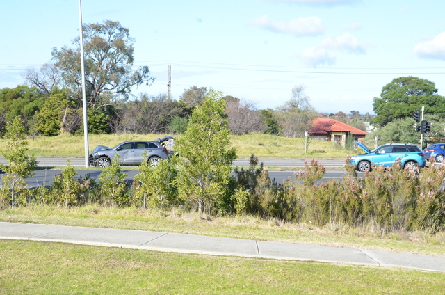 Person sent to hospital after collision damages light pole